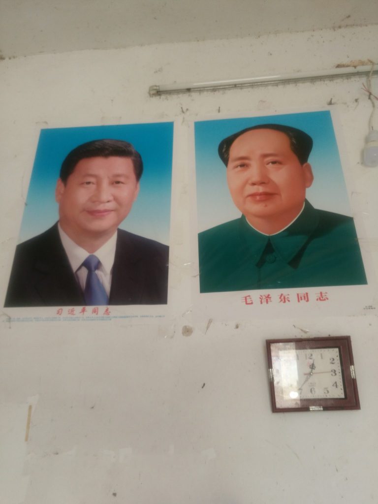 Portraits of Xi and Mao were hung on the wall of a Christian’s house.