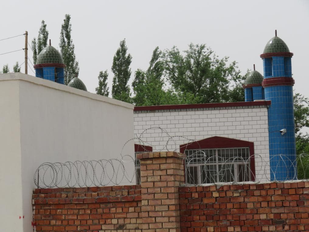 The crescent has been removed from the top of the Juma mosque in Shang Village