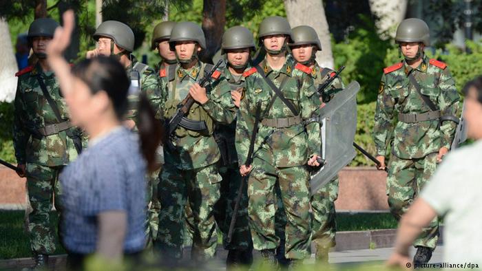 Chinese Policemen in a village