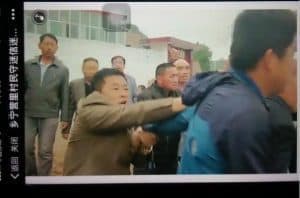 Villagers beat believers outside the church.