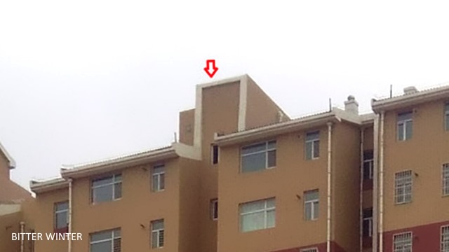 The building rooftop after the removal of Islamic symbols