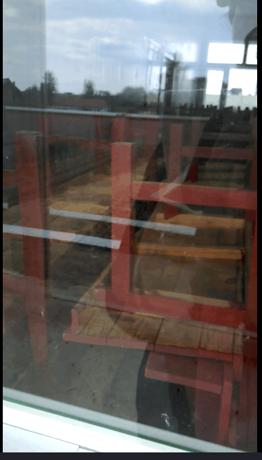 The Gaowopengtun Three-Self Church in Lugu village sealed up, tables and chairs in the church stacked up