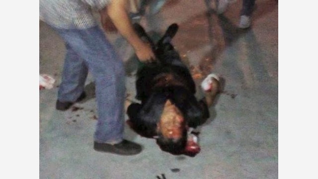 Zhang Zhongsu beaten to the ground by police
