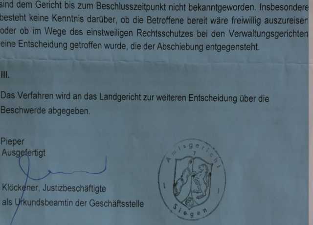 Decision of August 14 of the District Court of Siegen confirming the deportation order of Sister Zhao