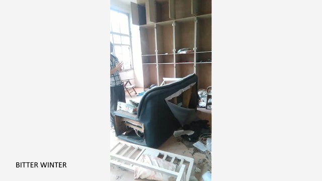 This bookshelf once held Bibles and other spiritual works; now, they have all been confiscated by the police