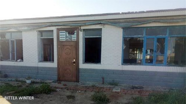 The windows at Sun Li’s home have been smashed.