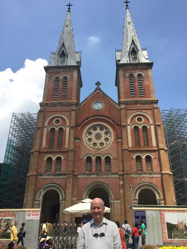 Massimo Introvigne in front of the Cathedral of Notre Dame, Saigon, Vietnam