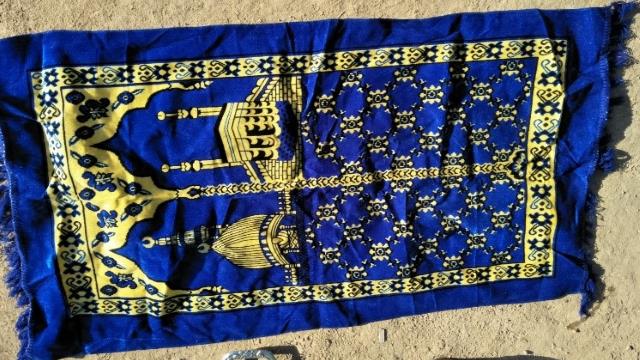 The pattern on this blanket resembles the shape of a mosque, and thus it is forbidden to be used
