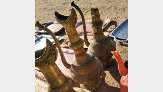 This copper kettle bears the crescent symbol found on mosques, and therefore, banned