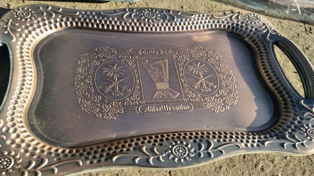 The tray, featuring a pattern of two swords, featured on some flags of Arab states, is also forbidden