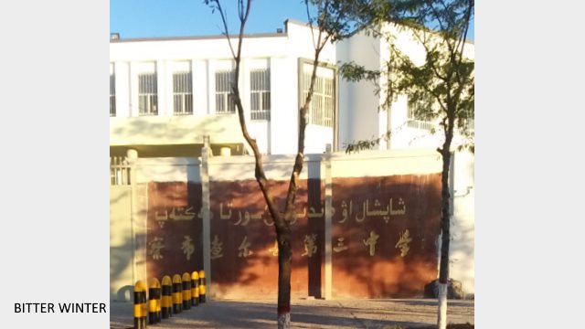 Qapqal Xibe county 3rd Middle School exterior: the windows inside the school have all been fitted with thick stainless-steel railing