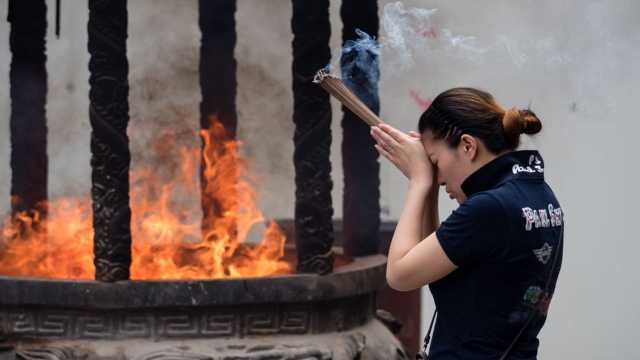 Incense burning in Shanghai. Posting a picture like this on the Internet will become illegal in China when the new draft becomes law.