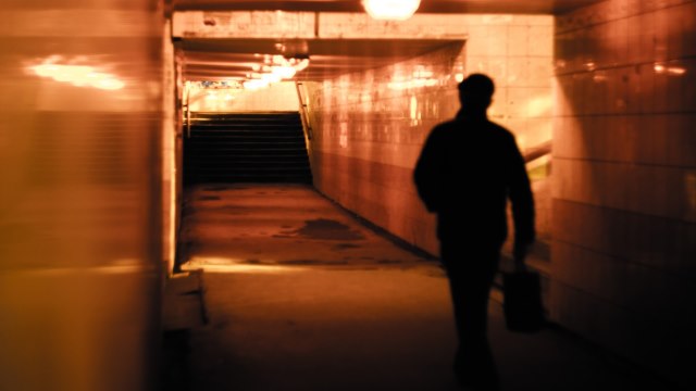 man walk in the underground tunnel