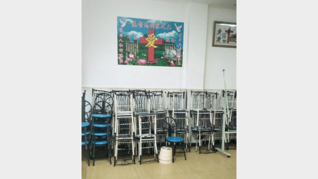 The meeting place is no longer in use; tables and chairs have been stacked up. (provided by an inside source)