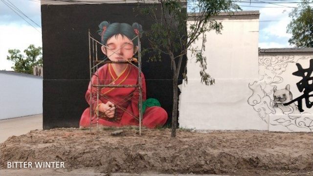 A mural of a Buddhist nun sitting in meditation has been modified into a “young girl.”