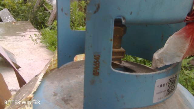 Xinjiang residents’ household gas tanks and shovels have been imprinted with codes