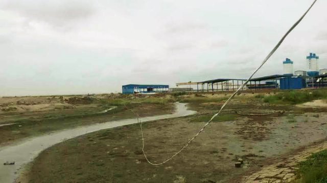 Licuo village’s mudflat sea area.