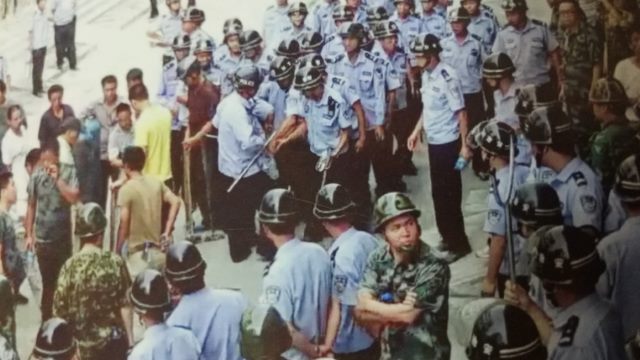 The local government sent in 300 police officers to threaten villagers into signing the agreement.