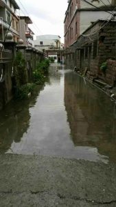 The streets around the Honggouli market used to flood because of the old sewer system.