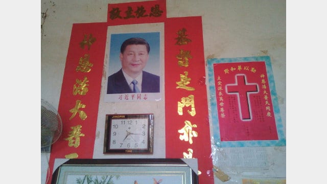 A portrait of Xi Jinping put up in the home of a Christian.