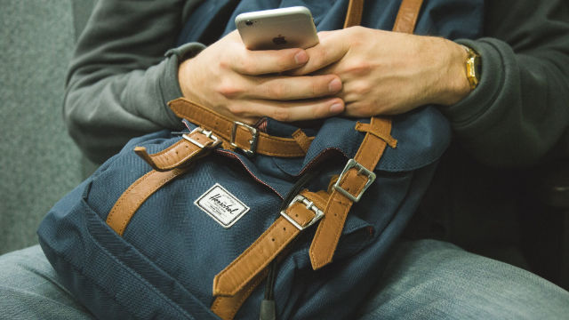 Man playing a phone
