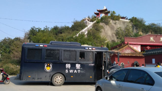 SWAT police guard at the foot of the mountain (provided by an inside source)