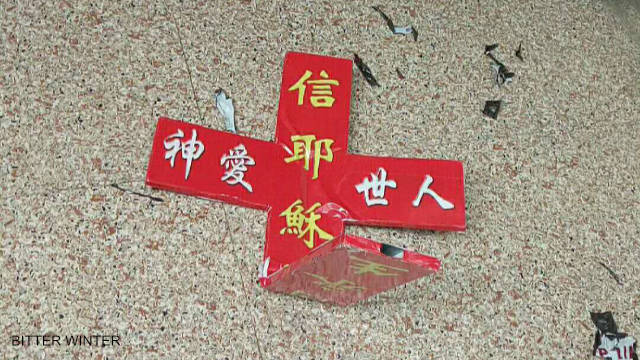 The cross is removed and destroyed