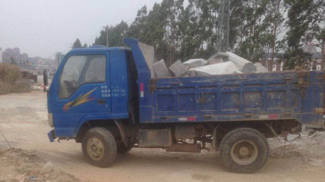 The government used a transport vehicle to haul the stones away. (provided by an inside source)