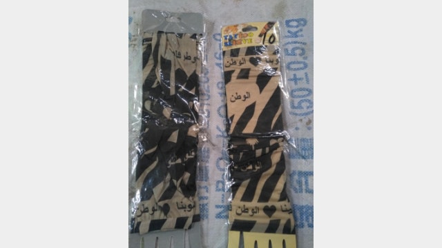 The use of scarves with Uyghur lettering is prohibited. (provided by an inside source)