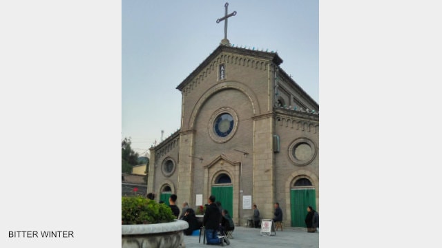 Believers hold mass outdoors 2