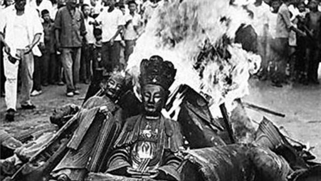 Buddhist statues burned