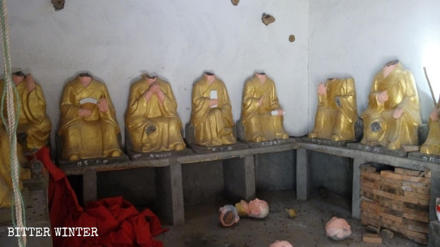 The Buddhist statues after being destroyed