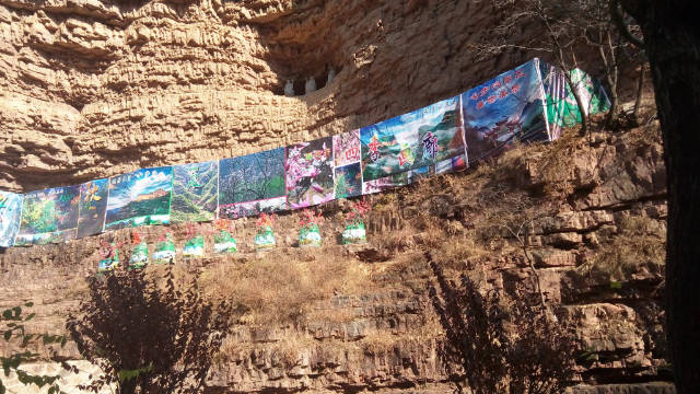 Advertising billboards concealed some Arhat statues.