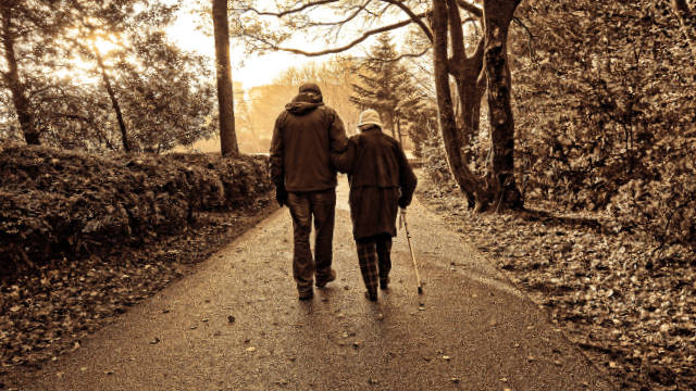 elders walking on the road