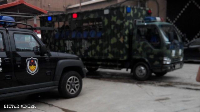 The police car that was used to transfer the arrested believers.