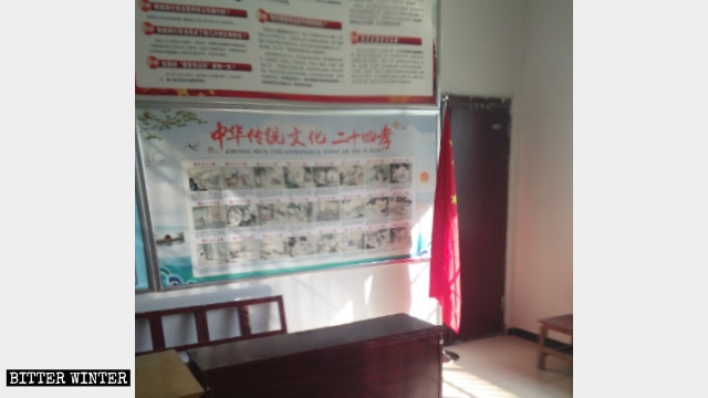 A poster with pictures of the “24 Filial Exemplars” is on display at Oubeisha Church.