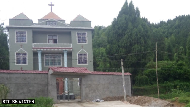 The Three-Self Gospel Church before authorities removed its cross.