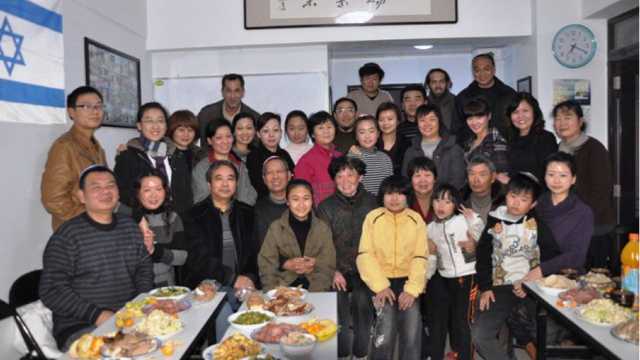 Members of the Kaifeng Jewish community meet for a dinner