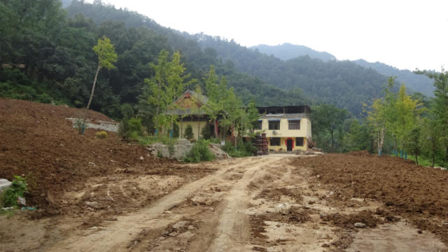 Scene after excavators buried the ruins