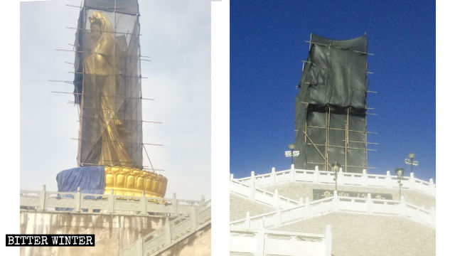 statue draped over by a black shroud