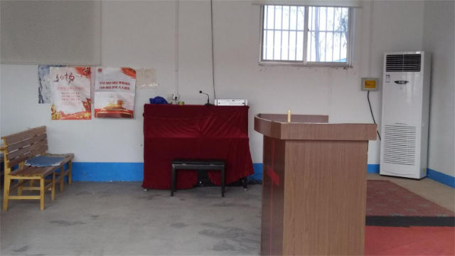 A propaganda poster of the Core Socialist Values posted in a Three-Self church