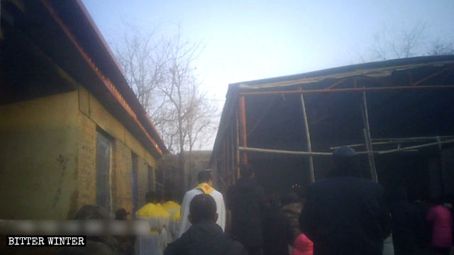 Believers attend open-air Mass in Xiezhuang village