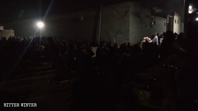 Believers attend open-air Mass