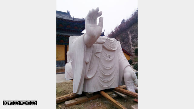 Guanyin statue’s body removed.
