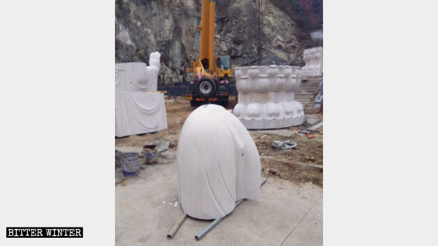 Guanyin statue in pieces.