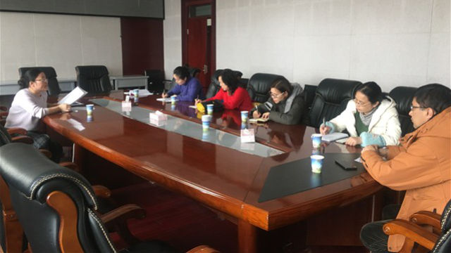 A meeting of teachers on assignment at Xinjiang Radio & Television University.