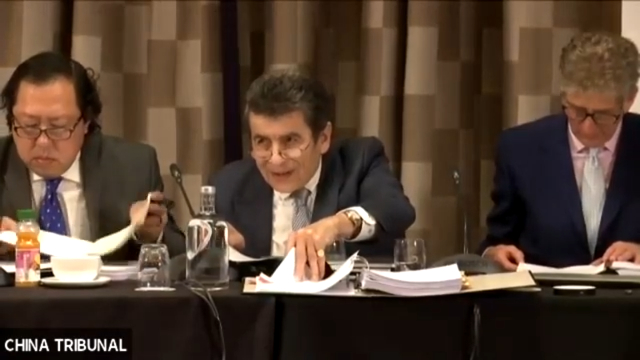 Sir Geoffrey Nice, QC, presiding over the Tribunal. On his right, Andrew Khoo, Malaysian lawyer and international human rights advocate, on his left, Nicholas Vetch, a businessman with particular interest in human rights.