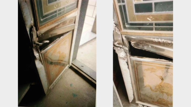 The police pried open the church ‘s back door, destroying it.