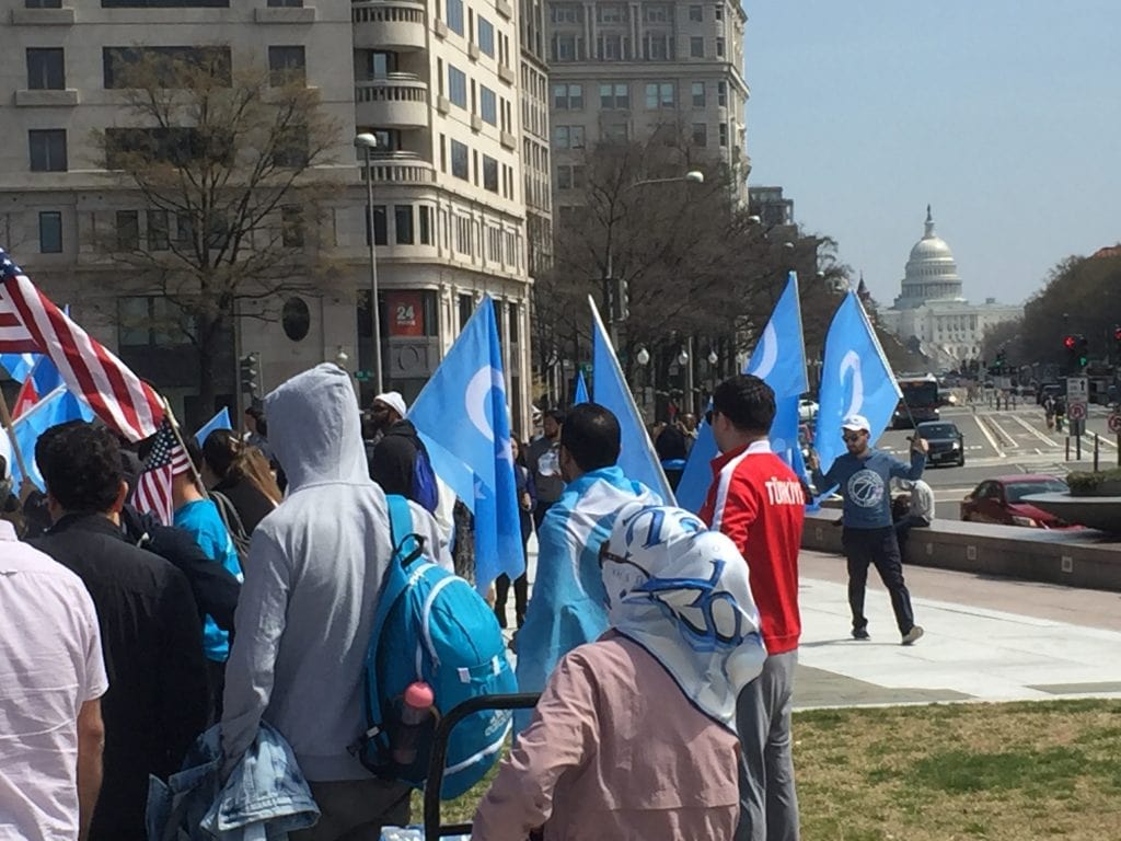 Uyghurs and supporters arriving at the rally