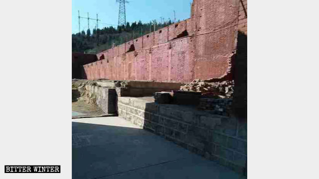 Only walls are left behind after the temple’s buildings were demolished.